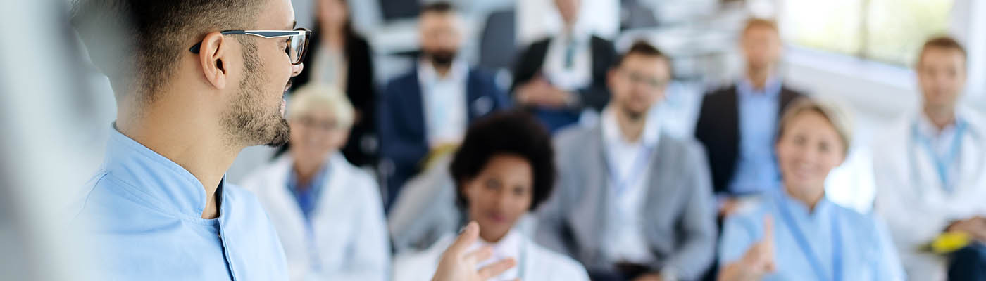 Healthcare workers attending a seminar.