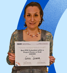 Gill Lever holding her certificate award